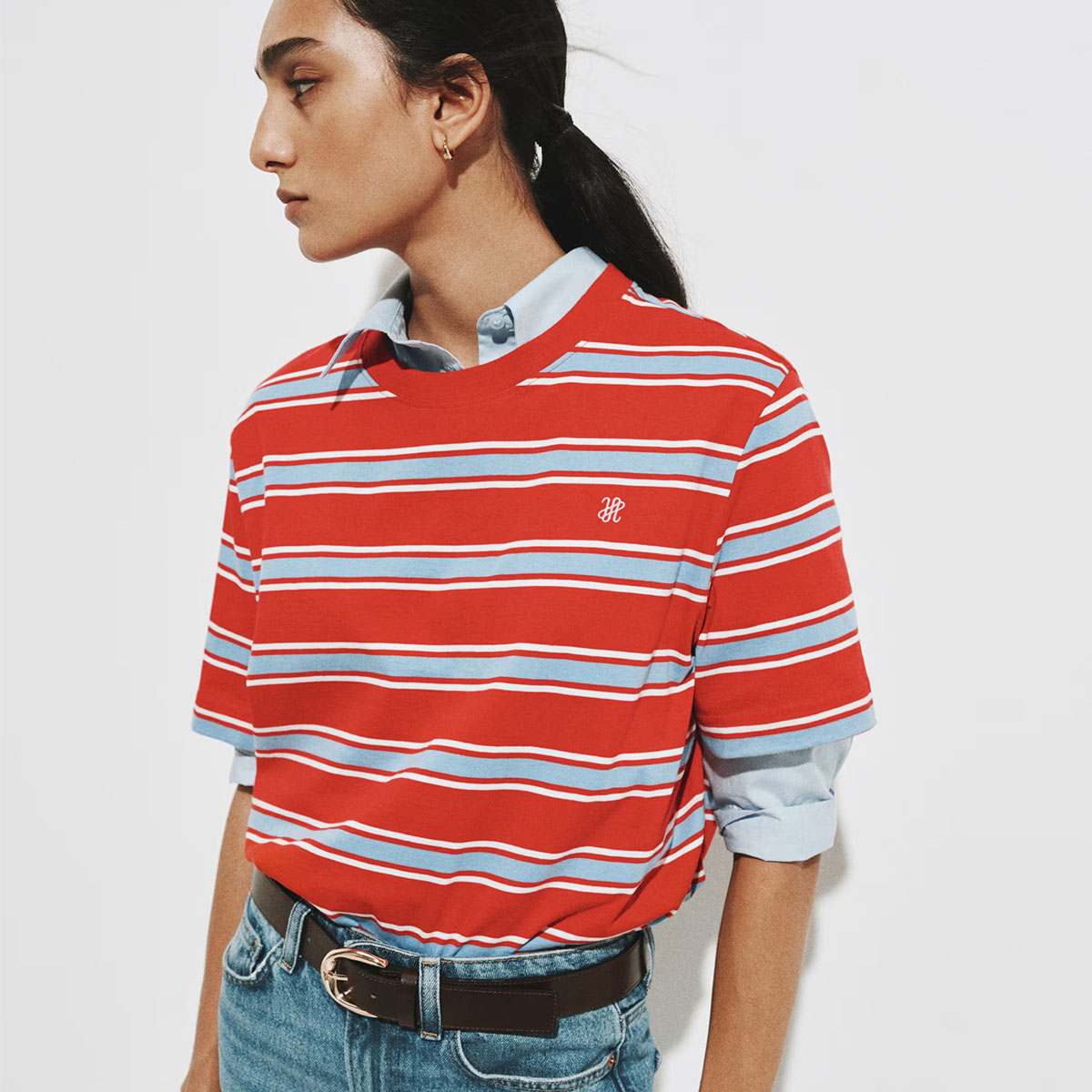 Woman in stripe t-shirt and jeans