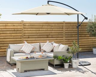 cantilever parasol with modern garden furniture