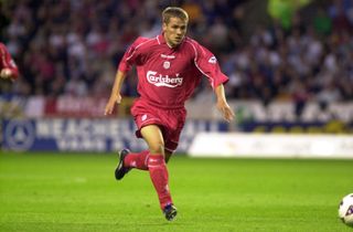 Michael Owen of Liverpool runs with the ball during a Premier League match, August 2001