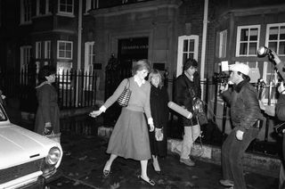 Lady Diana Spencer who is engaged to Prince Charles is hounded by the media at her flat in Coleherne Court in November 1980