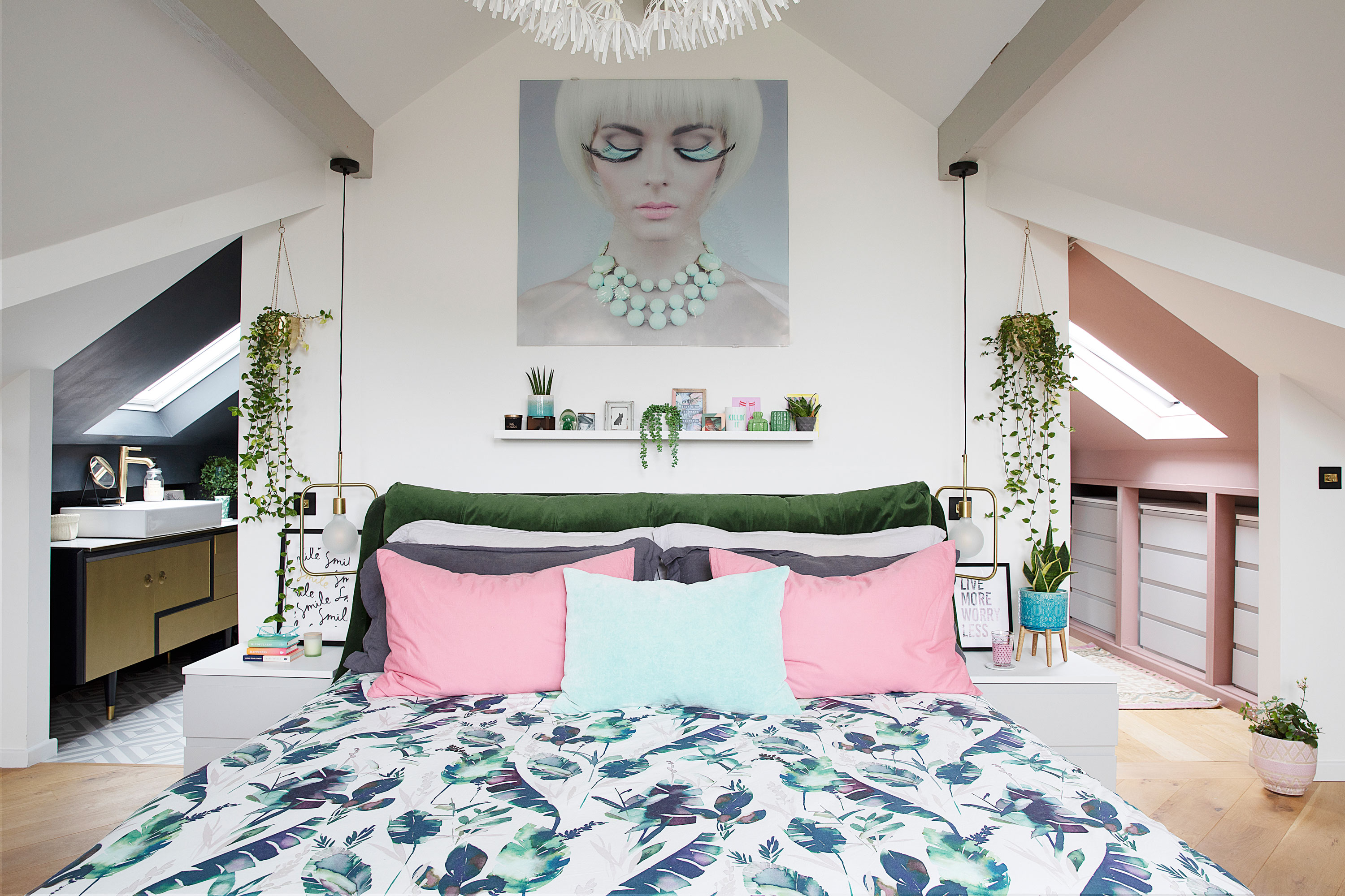 an eclectic loft bedroom with bed in the middle and a bathroom and wardrobe room to either side. January 2020: Debbie Goodwin set about lovingly renovating the bungalow her dad built