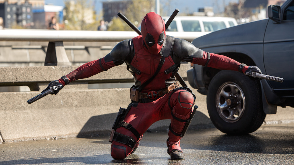 Deadpool poses with his pistols in his hands in his 2016 self-titled film