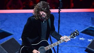 Dave Grohl says that he's going to put the Foo Fighters "back in the garage for a while."