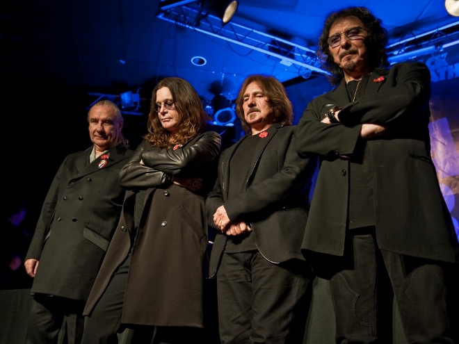 The band at the reunion announcement on November 2011