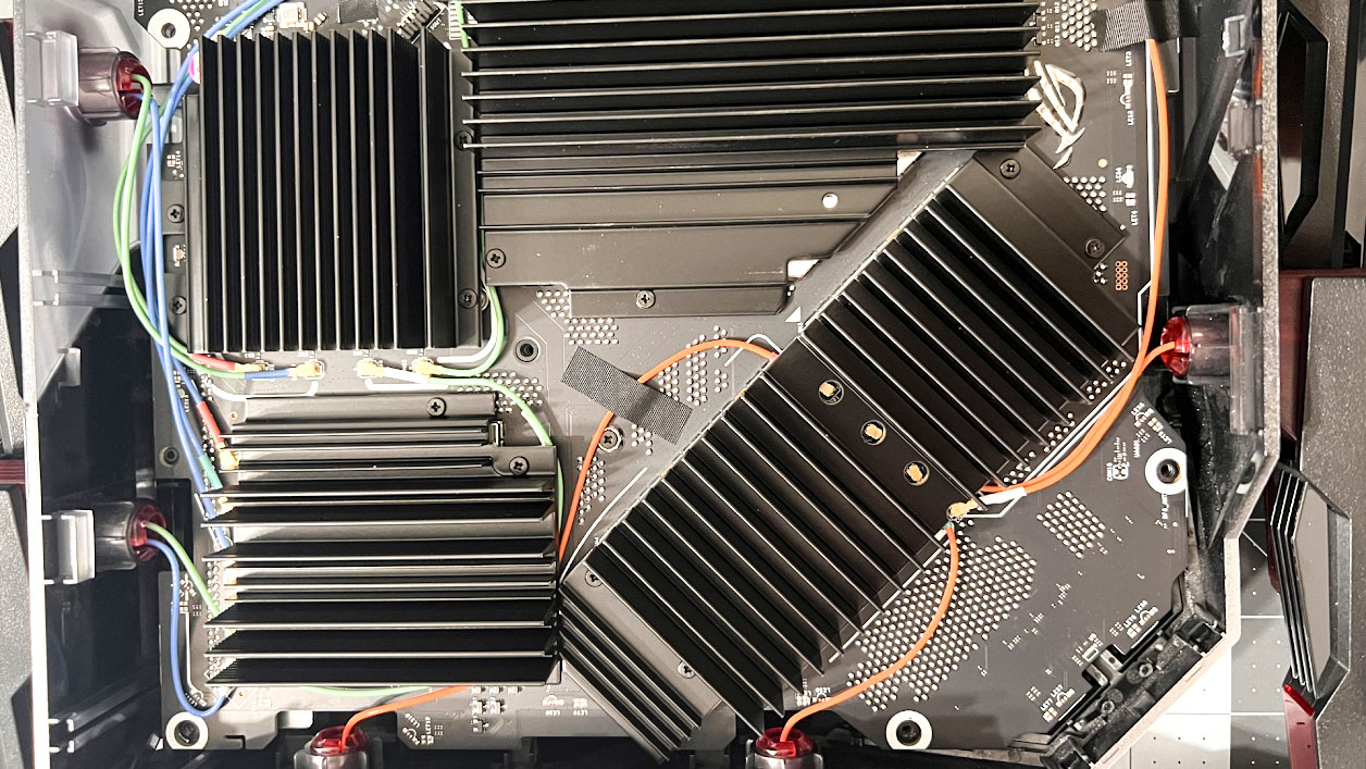 A close-up shot showing the internals and massive heatsinks of the Asus ROG Rapture GT-BN98 Pro gaming router