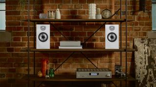 Bowers & Wilkins 607 S2 Anniversary Edition on a shelf