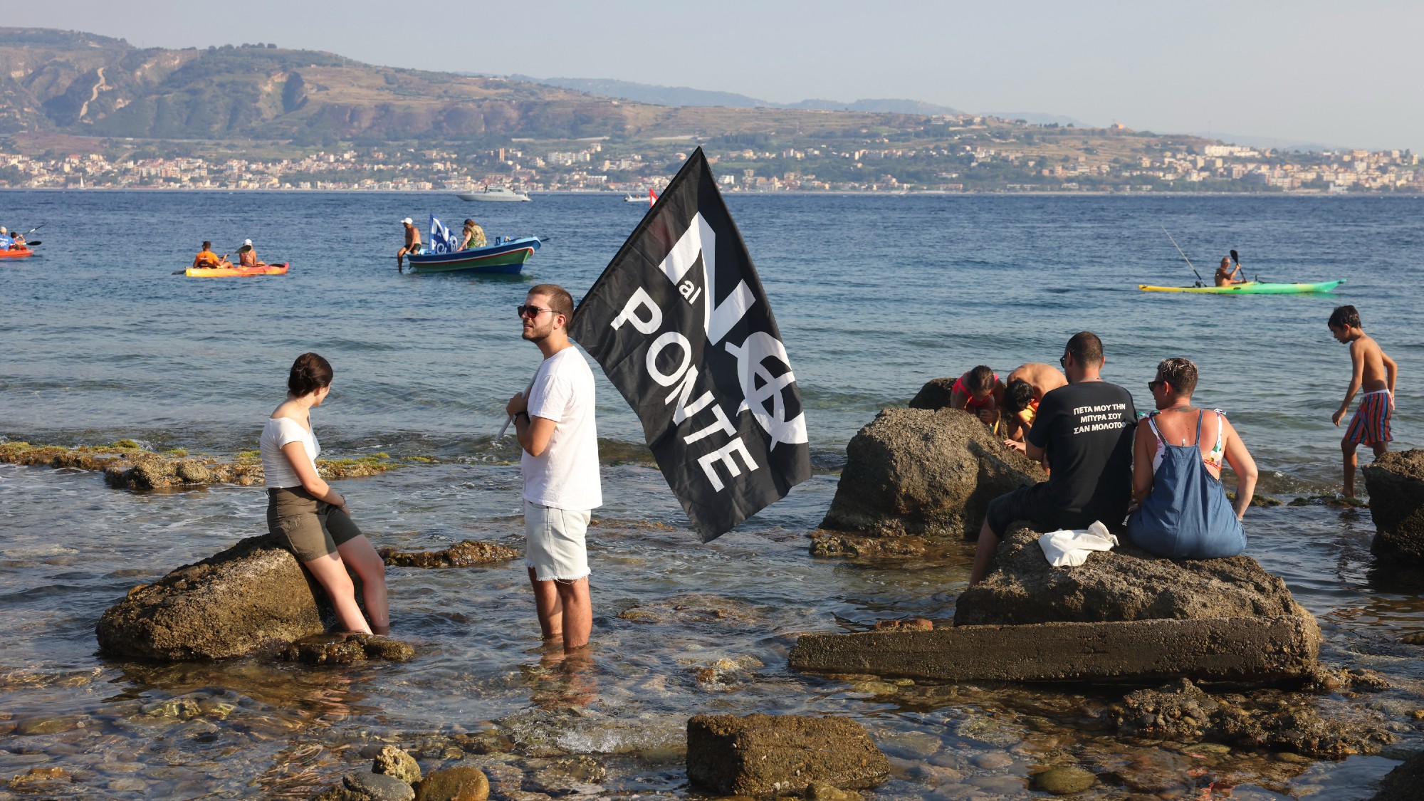 Protestors against the construction of the Bridge of the Strait of Messina at a demonstration in Torre Faro, north of Messina