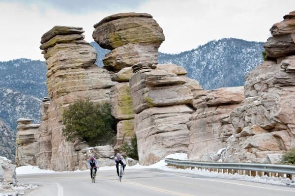 Riders ride along through the scenic Arizona countryside.