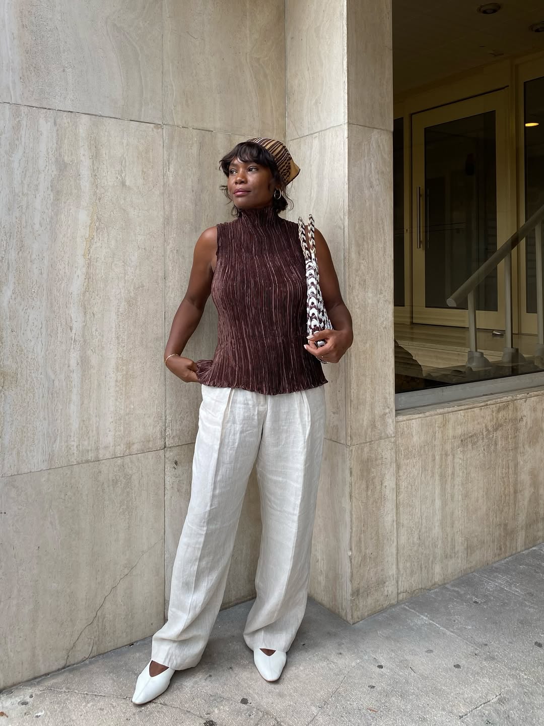 Franny in pleated top and linen trousers
