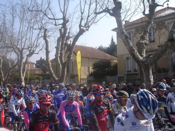 Riders line up for the start and the sun is out