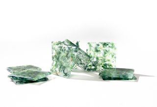‘Forite’ tiles made of clear and green recycled glass styled against a white background