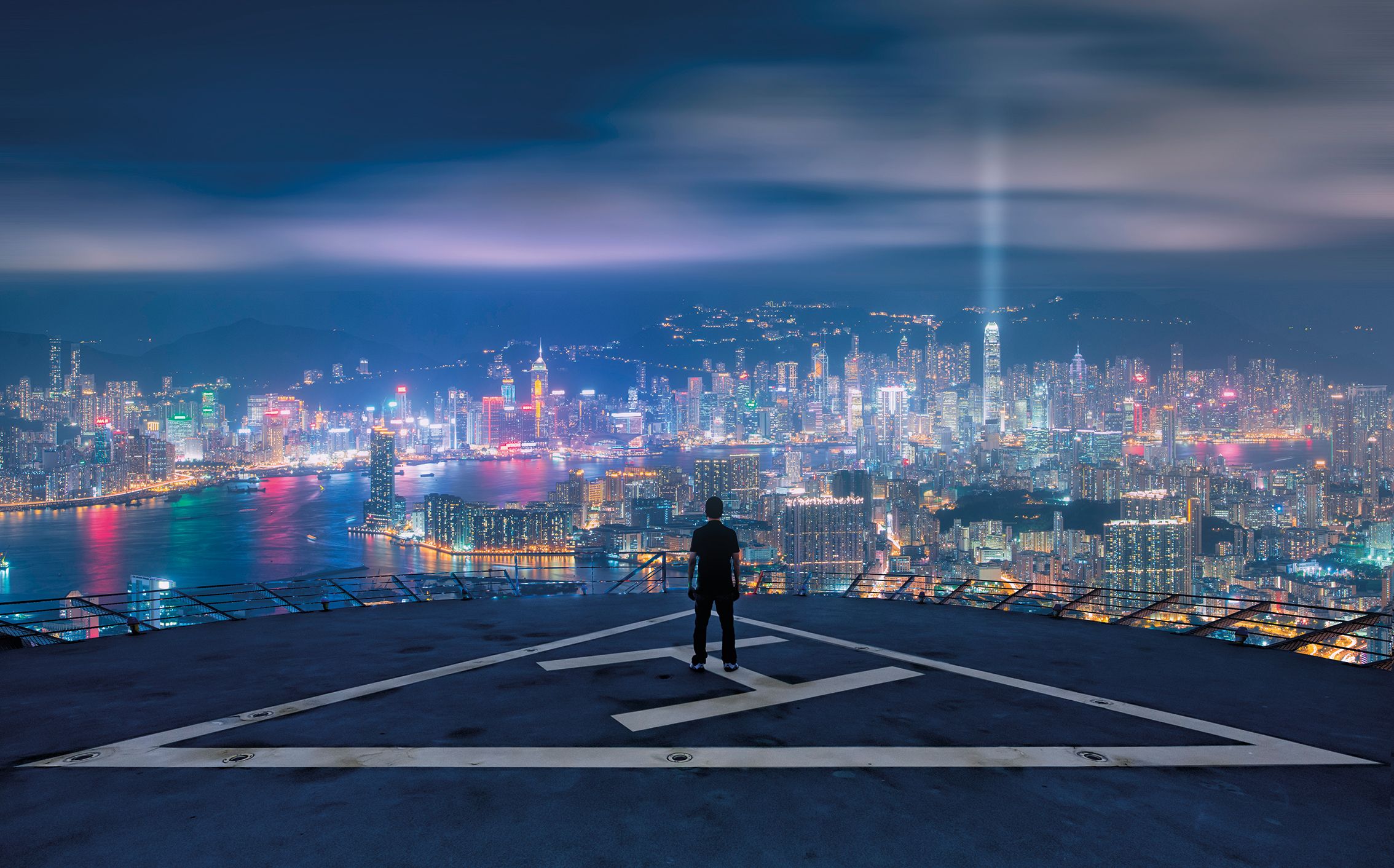"Capturing night cityscapes is a challenge," shooting from a helipad in Hong Kong
