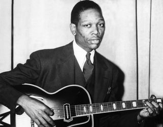 Charlie Christian plays guitar in an undated photo
