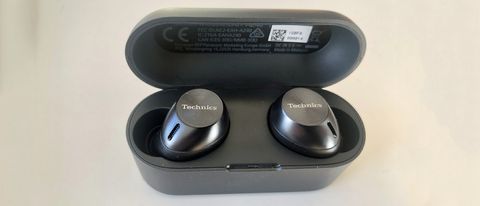 the technics eah-az40 true wireless earbuds in their charging case