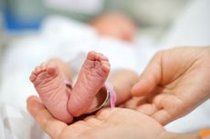 Close-up of newborn baby's feet.
