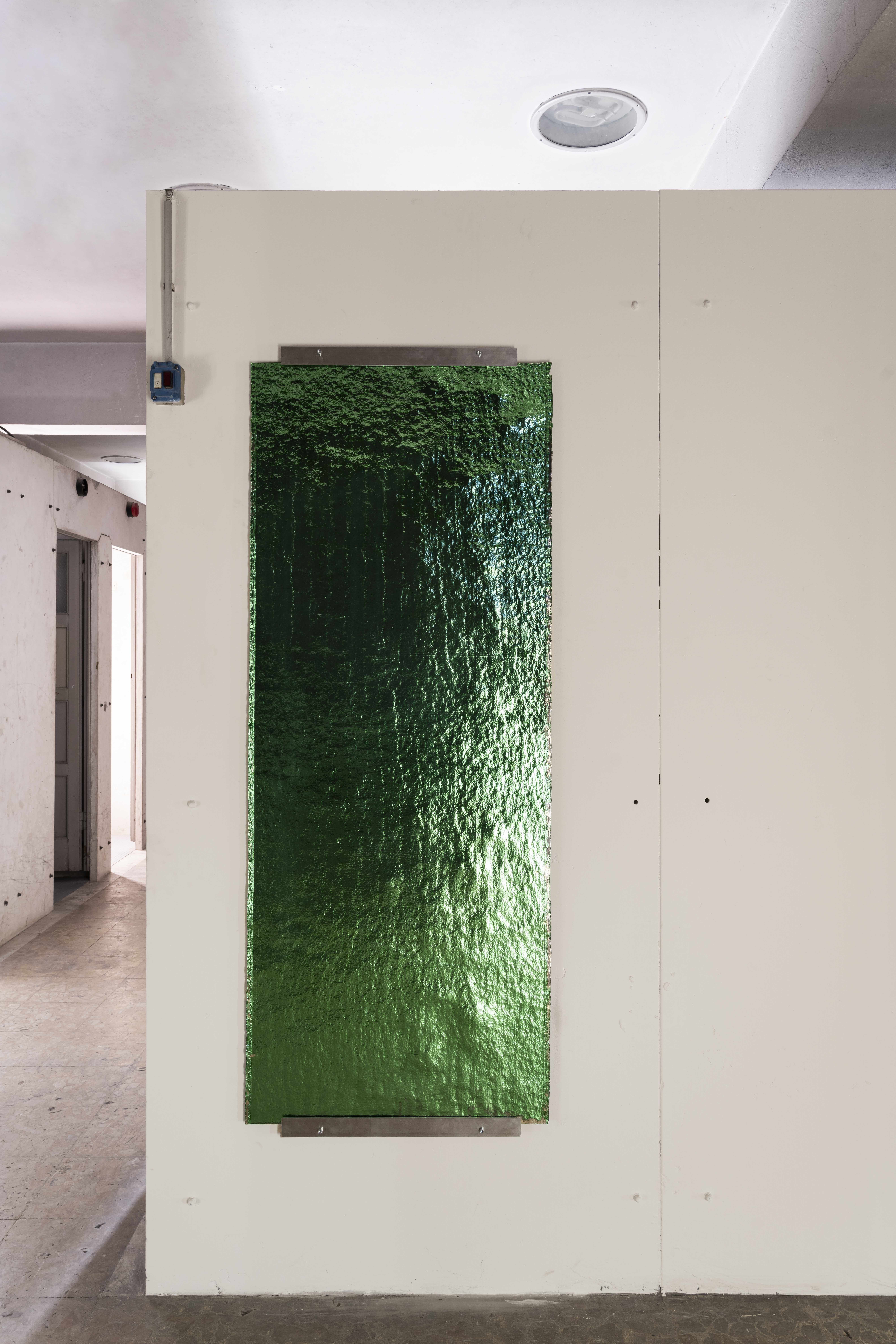 green wall-mounted glass panel