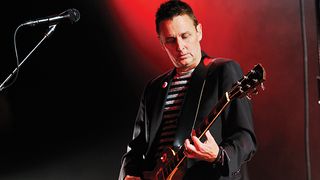 Mike McCready onstage at Manchester Evening News Arena on 21 June 2012