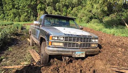 A would-be burglar has been caught after his getaway vehicle became stuck in manure