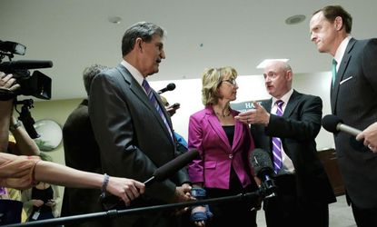 Gabby Giffords and her husband Mark Kelly meet with Sens. Joe Manchin (D-W.V) and Pat Toomey (R-Pa.) on April 16.
