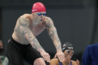 Check out Adam Peaty's many tattoos!