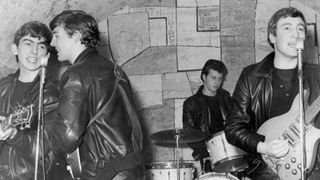 The Beatles performs onstage at the Cavern Club in February 1961 in Liverpool, England. (L-R) George Harrison, Paul McCartney, Pete Best, John Lennon