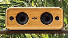 House of Marley Get Together 2 XL review: speaker in front of a leafy bush
