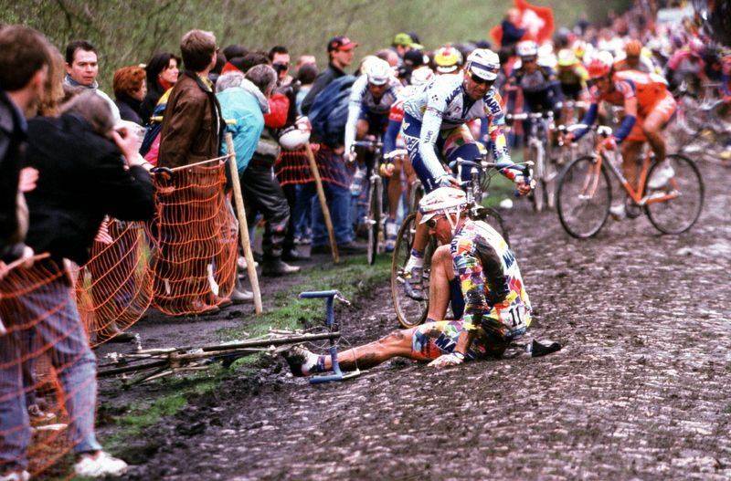 Johan Museeuw crashes in the Trou&eacute;e d'Arenberg, shattering his kneecap