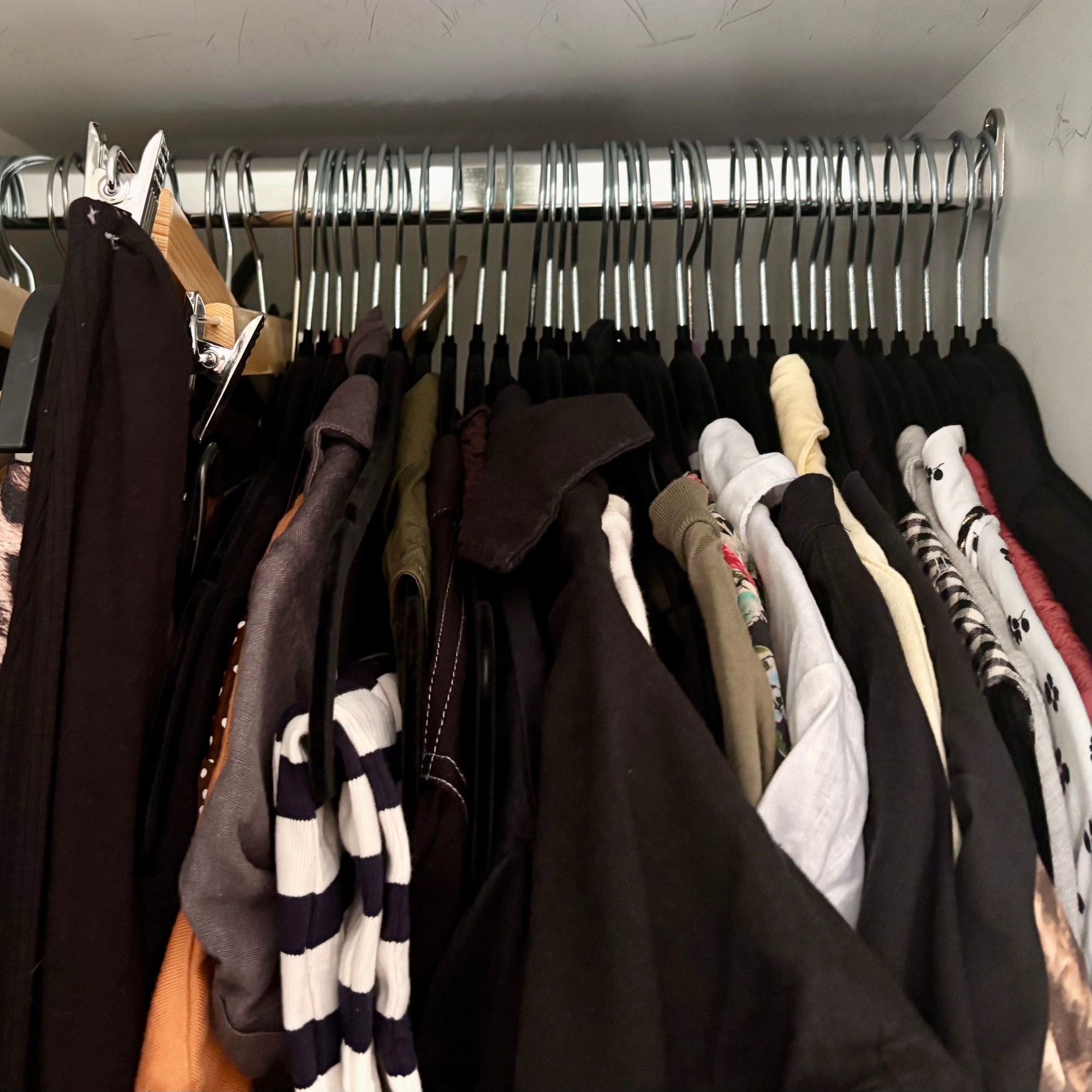 clothes in a wardrobe