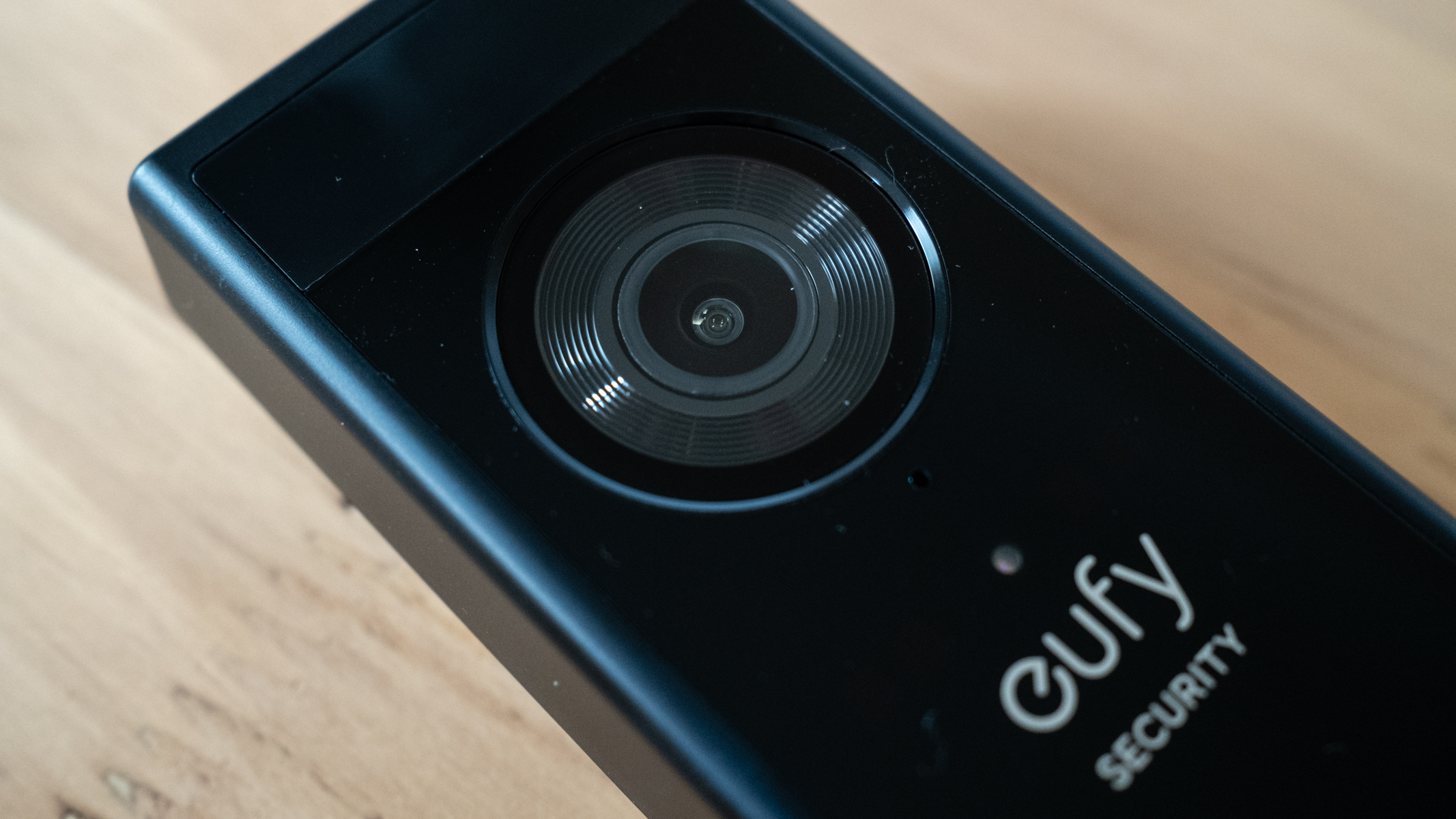 Eufy Video Doorbell E340 on a wooden table