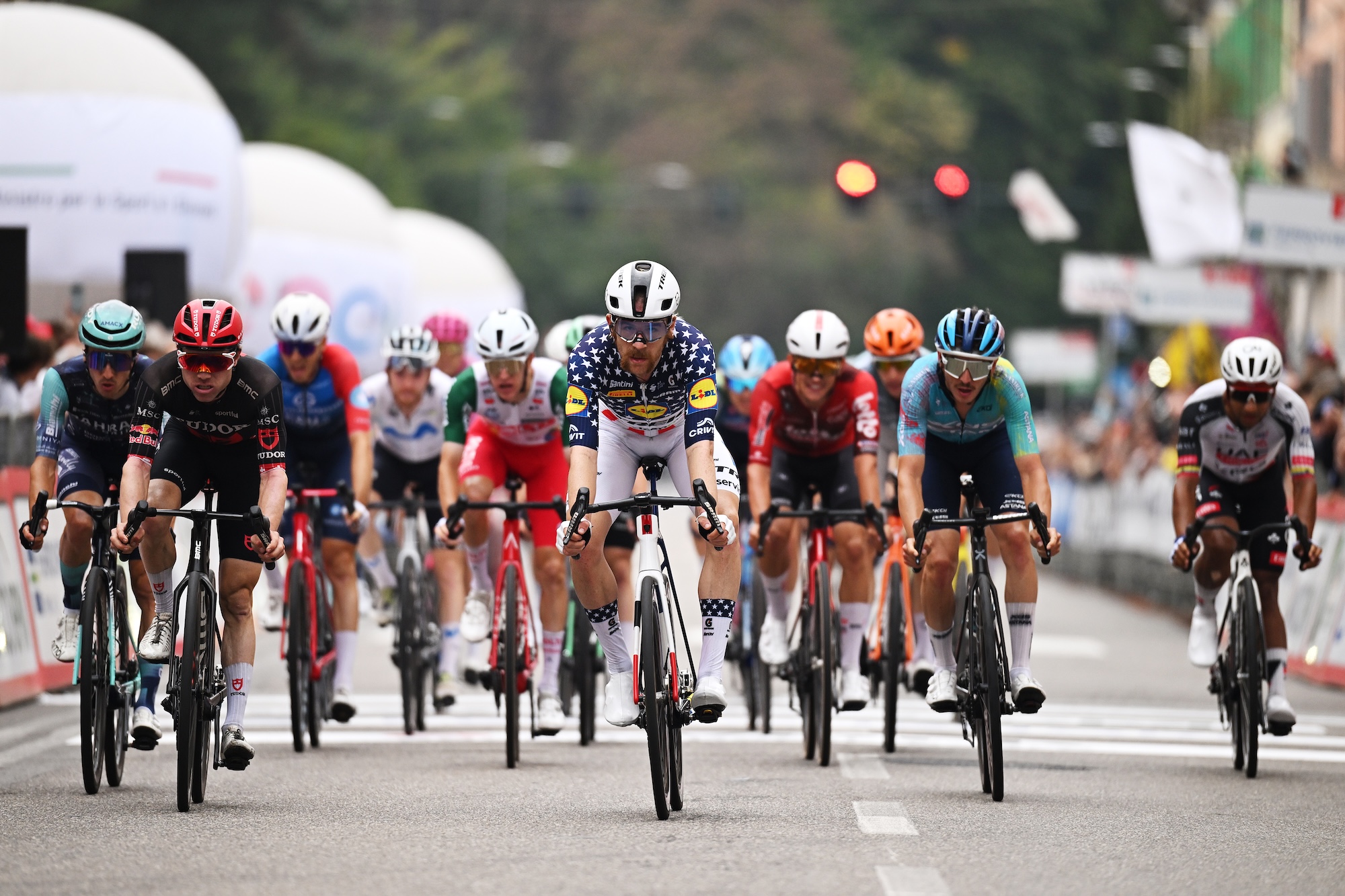 Quinn Simmons of Lidl - Trek crosses the finish line in fourth place at front of peloton at Tre Valli Varesine 2026