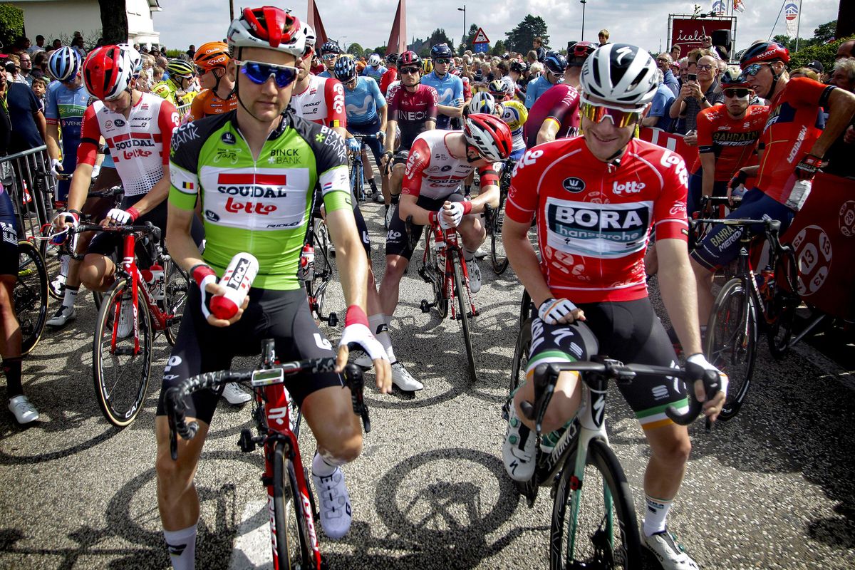 Tim Wellens and Sam Bennett at the start