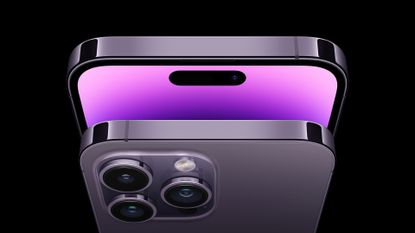 iPhone 14 Pro smartphone in purple colourway on black background