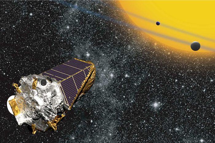 An artist&#039;s illustration of NASA&#039;s Kepler space telescope observing alien planets in deep space using the transit method. The space observatory has discovered more than 1,000 alien planets since its launch in March 2009. 