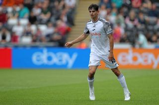 Charlie Patino of Swansea City in action during the Sky Bet Championship match between Swansea City and Coventry City at the Swansea.com Stadium on August 19, 2023 in Swansea, Wales.