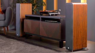 Q Acoustics M40 speakers in lifestyle shot with record player 