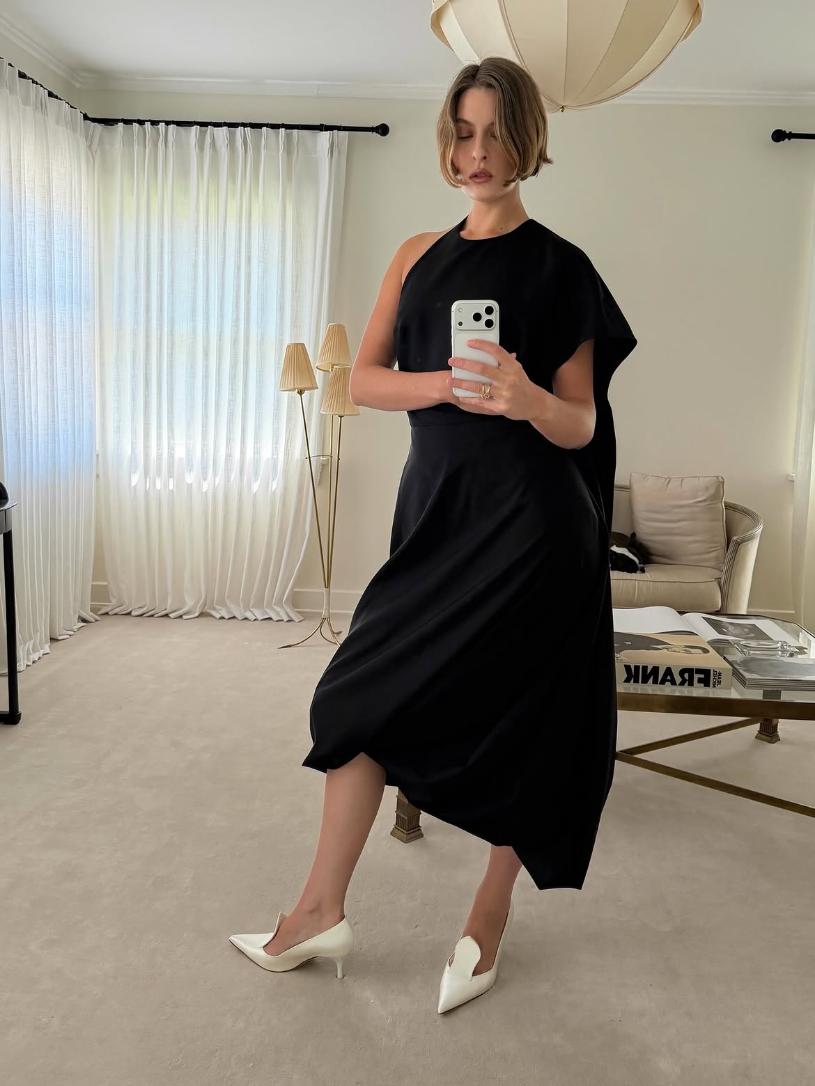 Christie Tyler wearing satin pumps.
