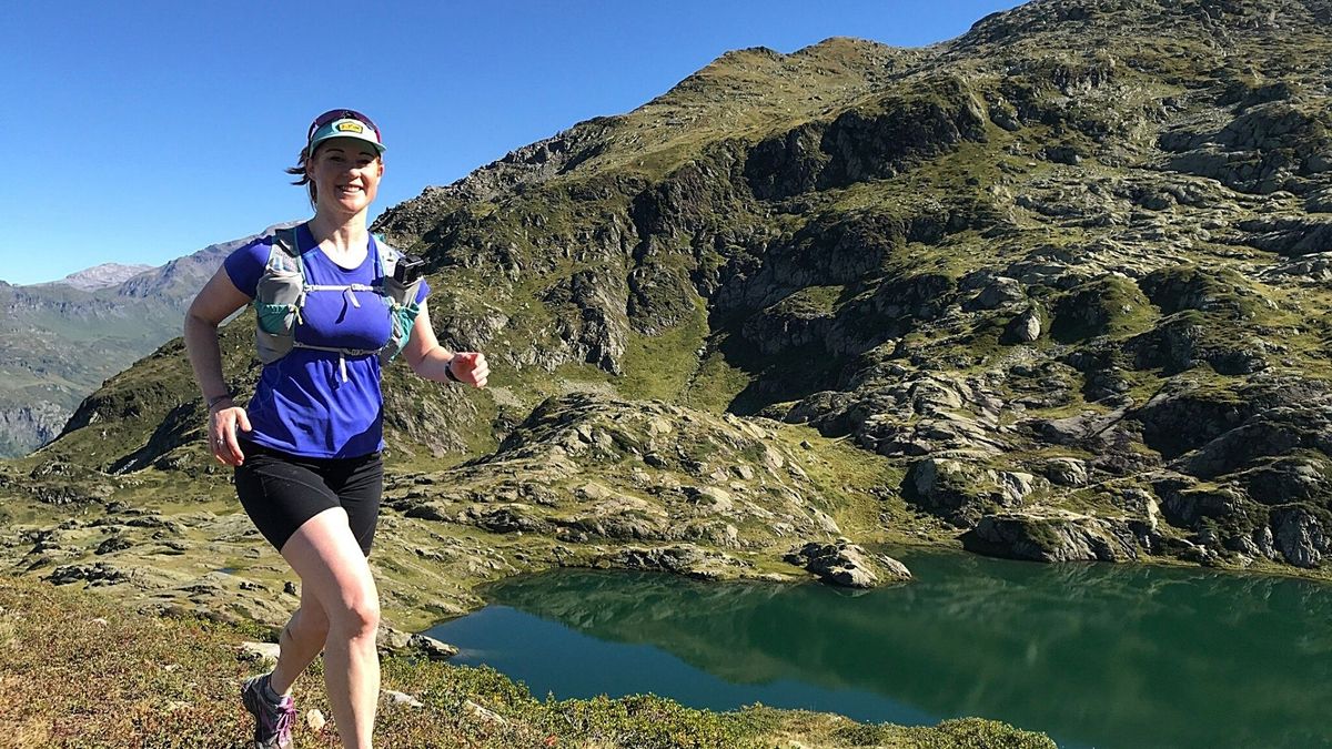 Claire Maxted running in the mountains