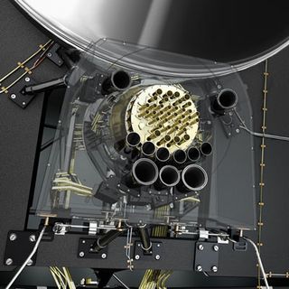 This artist's view shows the combined focal plane of the two instruments on board ESA's Planck spacecraft. The High Frequency Instrument (HFI) is visible as a circular forest of horns at the centre, surrounded by the Low Frequency Instrument (LFI) ring of