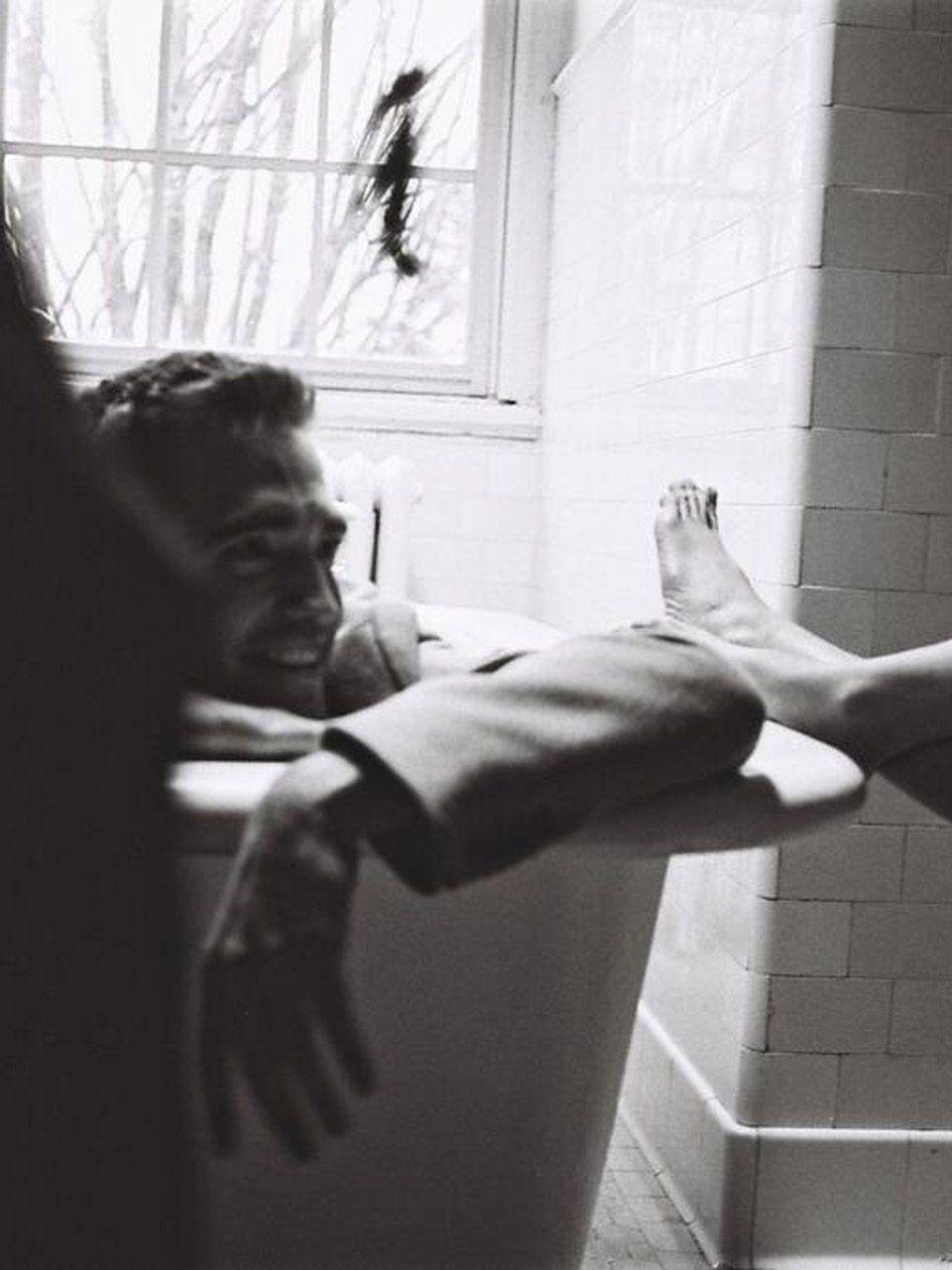 Robert Pattinson in a bath for Dior Homme campaign