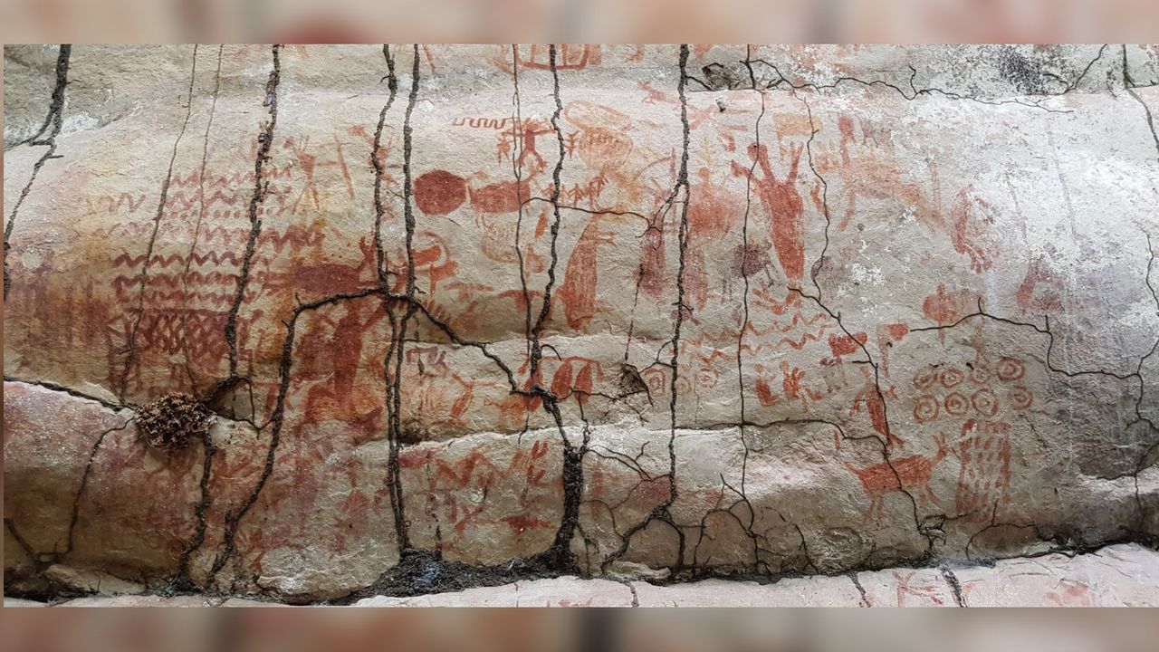 Rock art showing humans interacting with ice age animals.