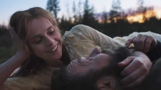 Joel Edgerton and Felicity Jones looking lovingly at each other in Train Dreams.