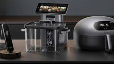 A variety of Typhur kitchen appliances on a modern, dark grey kitchen counter. 