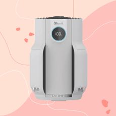 Shark NeverChange5 Air Purifier on a pink background