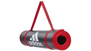 Adidas Training Mat rolled up with strap