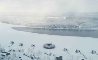 A aerial view of the resort and frozen lake Arctic Bath — Lapland, Sweden