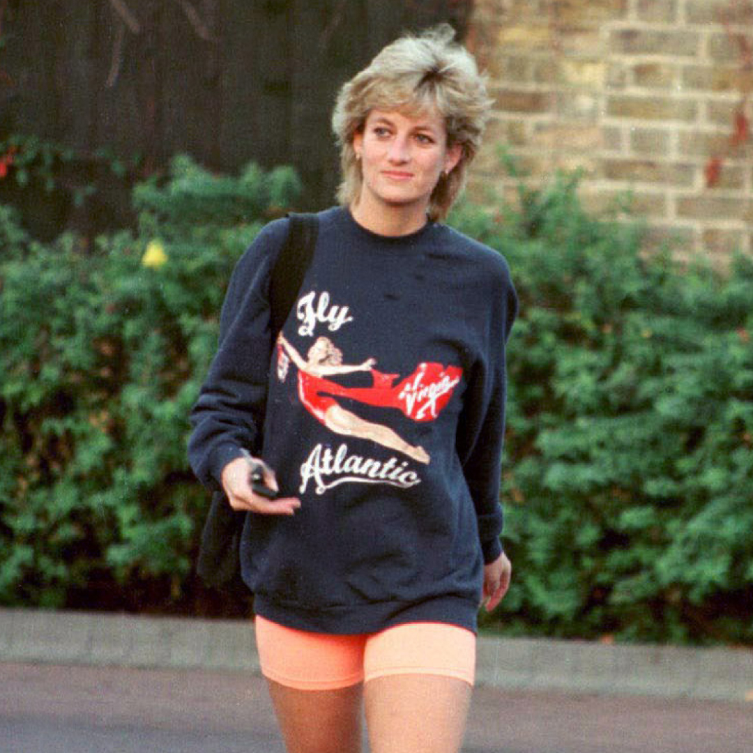 Princess Diana wearing a Virgin Atlantic sweatshirt and bike shorts