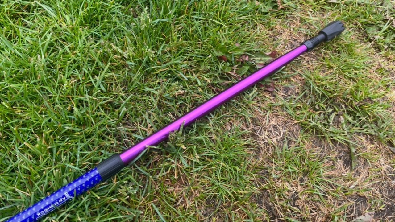Eurohike Trekker Antishock Walking Pole being used by Susan Griffin on grassy verge and product shot
