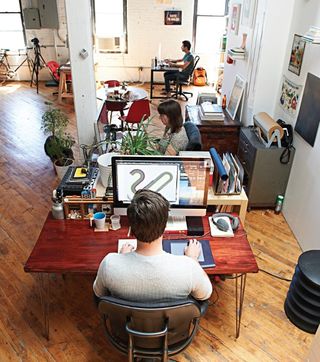 Potenza with fellow designers Liz Meyer and Dan Cassaro in their shared workspace