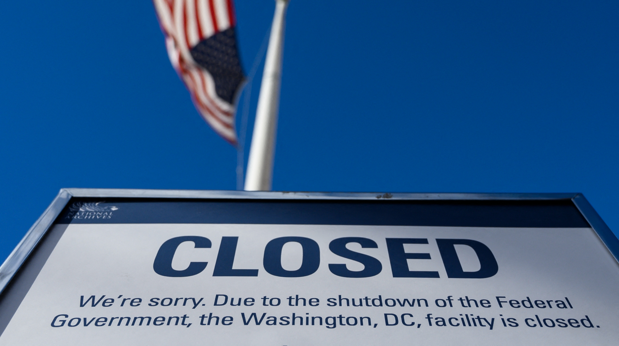 A sign is displayed on a government building that is closed because of a US government shutdown in Washington, DC, on December 22, 2018. 