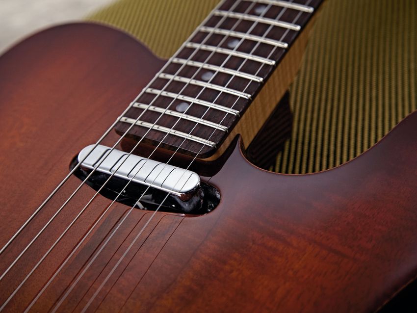 The Carved Koa Top Telecaster's neck pickup is a hot and bright variation.